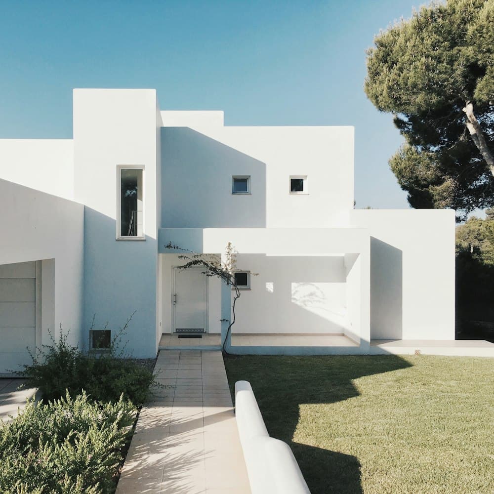 A modern home exterior at dusk